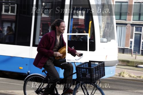Amsterdam 15 februari 2022
Edwin Oudshoorn met hoed op de fiets in Amsterdam