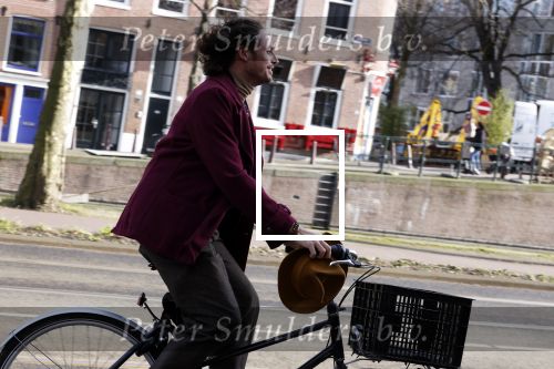 Amsterdam 15 februari 2022
Edwin Oudshoorn met hoed op de fiets in Amsterdam