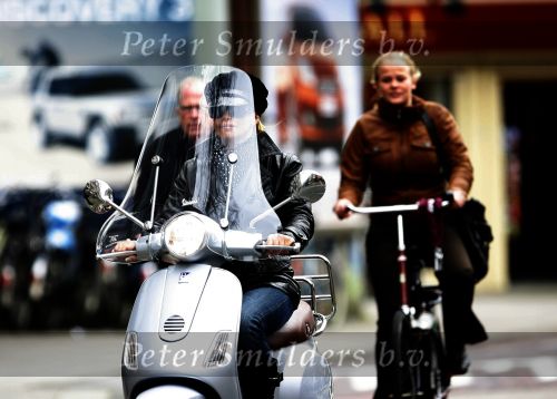 Amsterdam 3 maart 2007
Connie en hans Breukhoven op de vespa scooter in amsterdam.