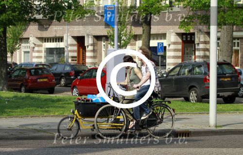 Amsterdam 23 april 2011
Susan Visser en vriend Dennis v d Ven op de fiets in Amsterdam.
Peter Smulders bv