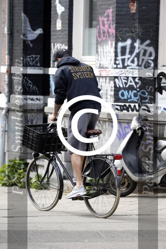 Amsterdam 28 april 2013
Arie Boomsma op de fiets in amsterdam.
Peter Smulders bv