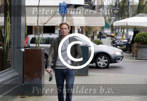 Amsterdam 19 april 2013
Ajax speler Christian Poulsen met zijn vrouw op de cornelis schuytstraat.
Peter Smulders bv