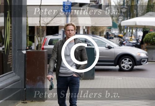 Amsterdam 19 april 2013
Ajax speler Christian Poulsen met zijn vrouw op de cornelis schuytstraat.
Peter Smulders bv
