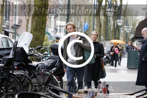 Amsterdam 19 april 2013
Ajax speler Christian Poulsen met zijn vrouw op de cornelis schuytstraat.
Peter Smulders bv