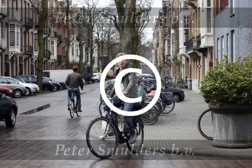 Amsterdam 19 april 2013
Ajax speler Christian Poulsen met zijn vrouw op de cornelis schuytstraat.
Peter Smulders bv