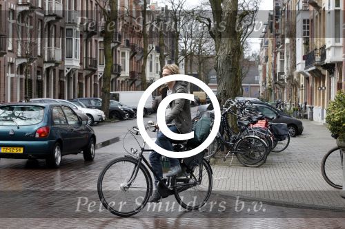 Amsterdam 19 april 2013
Ajax speler Christian Poulsen met zijn vrouw op de cornelis schuytstraat.
Peter Smulders bv