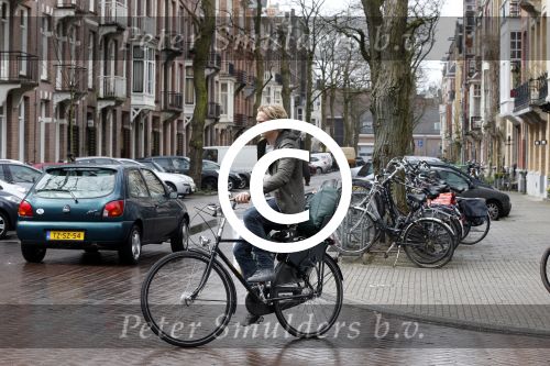 Amsterdam 19 april 2013
Ajax speler Christian Poulsen met zijn vrouw op de cornelis schuytstraat.
Peter Smulders bv