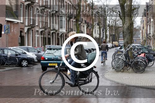 Amsterdam 19 april 2013
Ajax speler Christian Poulsen met zijn vrouw op de cornelis schuytstraat.
Peter Smulders bv