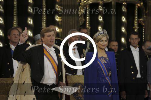 King Willem-Alexander takes the oath next to his wife Queen Maxima at Nieuwe Kerk or New Church in Amsterdam, The Netherlands, during the inauguration, Tuesday April 30, 2013. POOL/PETER DEJONG