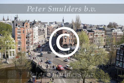 Amsterdam 15 april 2015
Dave en Dries Roelvink metselen een steen met daarop hun naam in de Westertoren. Dave heeft een tatoo van de westertoren op zijn arm staan.