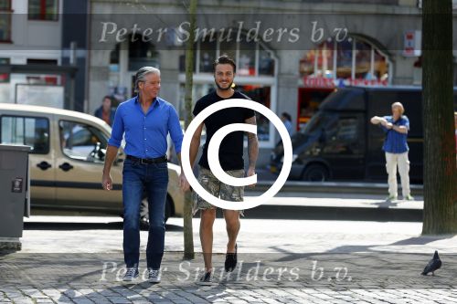 Amsterdam 15 april 2015
Dave en Dries Roelvink metselen een steen met daarop hun naam in de Westertoren. Dave heeft een tatoo van de westertoren op zijn arm staan.