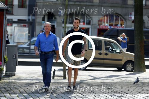 Amsterdam 15 april 2015
Dave en Dries Roelvink metselen een steen met daarop hun naam in de Westertoren. Dave heeft een tatoo van de westertoren op zijn arm staan.