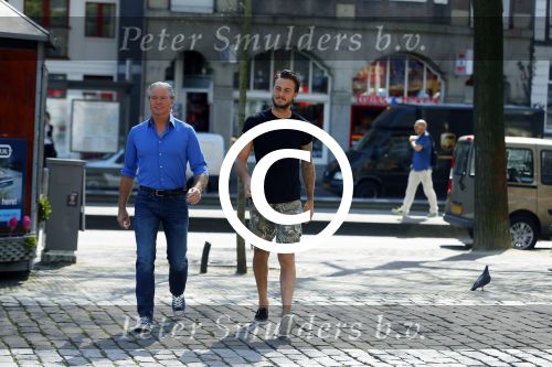 Amsterdam 15 april 2015
Dave en Dries Roelvink metselen een steen met daarop hun naam in de Westertoren. Dave heeft een tatoo van de westertoren op zijn arm staan.