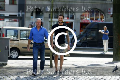 Amsterdam 15 april 2015
Dave en Dries Roelvink metselen een steen met daarop hun naam in de Westertoren. Dave heeft een tatoo van de westertoren op zijn arm staan.