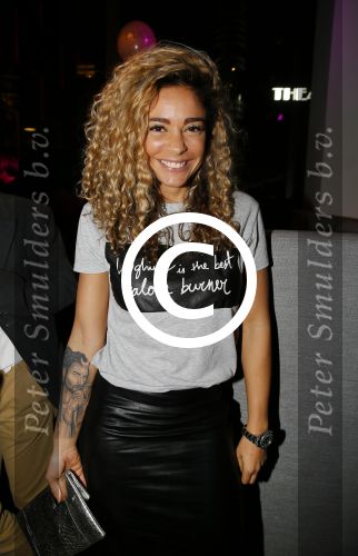 Rotterdam 9 april 2015
Fajah Lourens met haar nieuwe vriend bij de opening van de nieuwe zaak waar Winston Post de manager is in het Hilton Hotel.