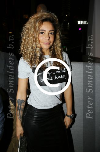 Rotterdam 9 april 2015
Fajah Lourens met haar nieuwe vriend bij de opening van de nieuwe zaak waar Winston Post de manager is in het Hilton Hotel.