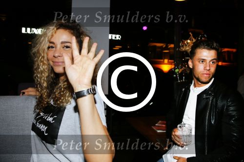 Rotterdam 9 april 2015
Fajah Lourens met haar nieuwe vriend bij de opening van de nieuwe zaak waar Winston Post de manager is in het Hilton Hotel.