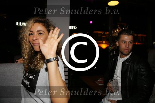 Rotterdam 9 april 2015
Fajah Lourens met haar nieuwe vriend bij de opening van de nieuwe zaak waar Winston Post de manager is in het Hilton Hotel.
