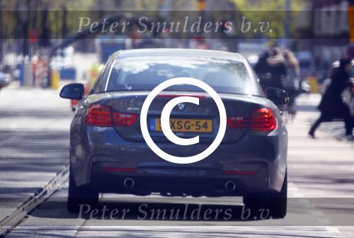 Amsterdam 30 april 2015  
Koen Verweij met (een) vriendin in zijn bmw cabrio en op straat