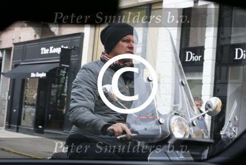 Amsterdam 11 april 2015   
Leco v Zadelhoff op zijn scooter op de pc hooftstraat