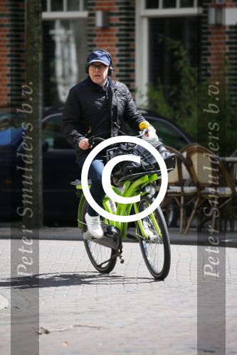 Amsterdam 28 april 2015  
Marc-Marie Huijbregts op de fiets in amsterdam