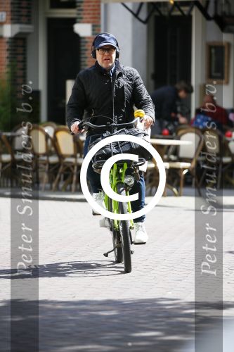 Amsterdam 28 april 2015  
Marc-Marie Huijbregts op de fiets in amsterdam