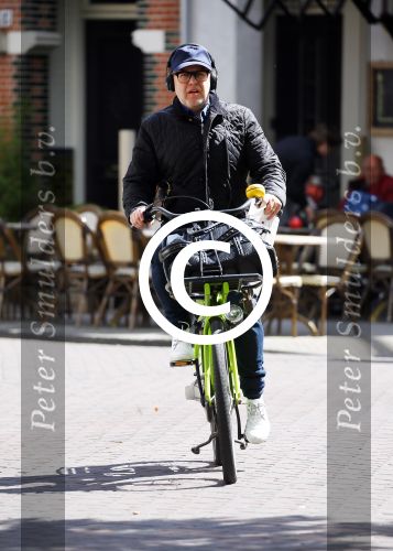 Amsterdam 28 april 2015  
Marc-Marie Huijbregts op de fiets in amsterdam