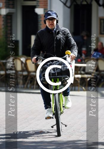 Amsterdam 28 april 2015  
Marc-Marie Huijbregts op de fiets in amsterdam