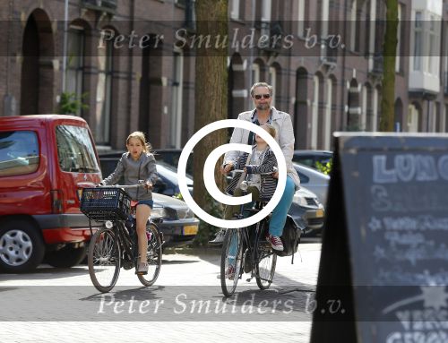 Amsterdam 21 april 2015  
Patrick Stoof met dochter op de fiets.