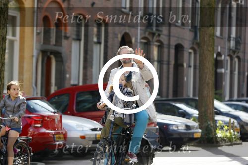 Amsterdam 21 april 2015  
Patrick Stoof met dochter op de fiets.