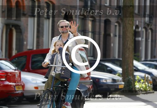 Amsterdam 21 april 2015  
Patrick Stoof met dochter op de fiets.