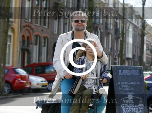 Amsterdam 21 april 2015  
Patrick Stoof met dochter op de fiets.