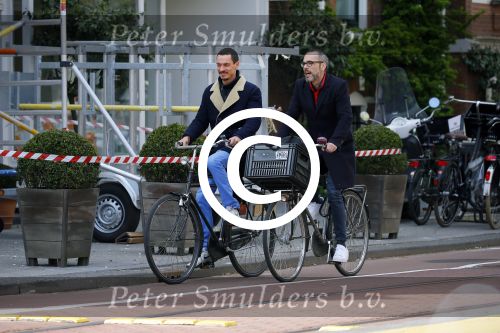 Amsterdam 28 april 2015
Rolf Snoeren (Viktor&Rolf) met zijn partner fietsend door amsterdam