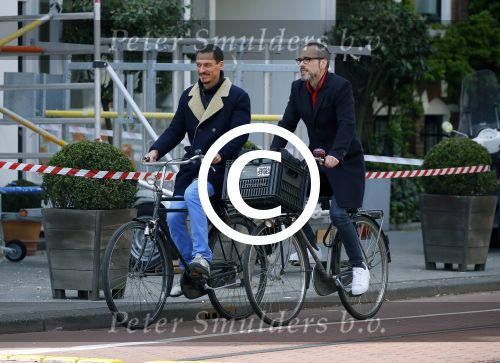 Amsterdam 28 april 2015
Rolf Snoeren (Viktor&Rolf) met zijn partner fietsend door amsterdam