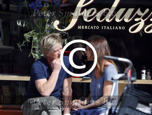 Amsterdam 13 april 2015
Wim Kieft met (ex)vriendin suzanne Martens en hun dochtertje op terras.