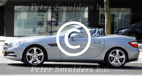 Amsterdam 13 mei 2016
Evert Santegoeds met partner Robert Halewijn in Mercedes cabrio.