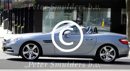 Amsterdam 13 mei 2016
Evert Santegoeds met partner Robert Halewijn in Mercedes cabrio.