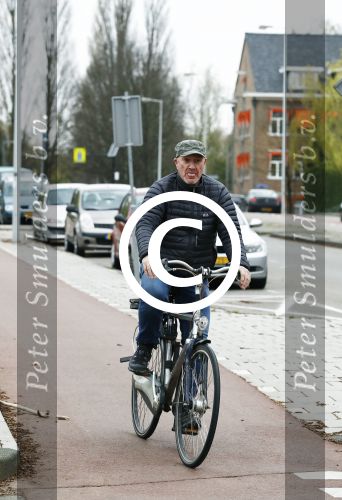 Amsterdam 18 april 2016 
Henk Poort op de fiets in Amsterdam.