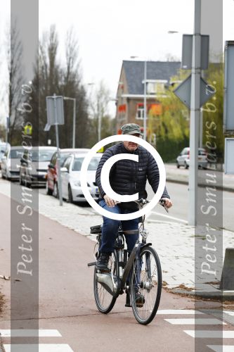 Amsterdam 18 april 2016 
Henk Poort op de fiets in Amsterdam.