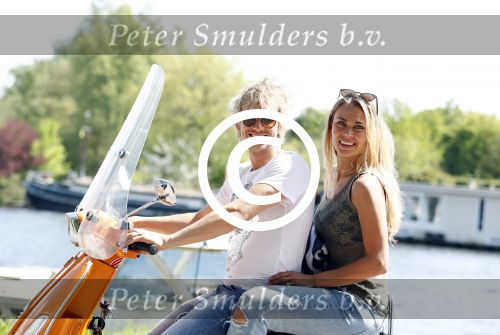 Amsterdam 7 mei 2016 
Michelle van Nood en haar vriend Koen Brouwer op hun vespa scooter. Michelle en Koen zijn de populaire deelnemers aan het RTL programma SOS survival of the Sexes