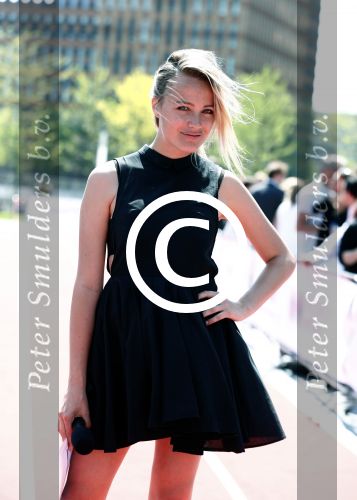 Amsterdam 12 mei 2016 
Tess Milne presenteert de business Run op de zuidas. De promotie dames zijn van Stella agency.