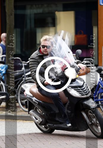Amsterdam 16 april 2016
Wesly Bronkhorst op zijn scooter op de PC hooftstraat