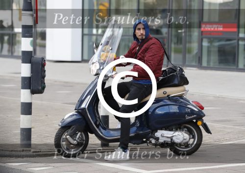 Amsterdam 13 april 2017 
Daniel de Ridder op zijn vespa scooter