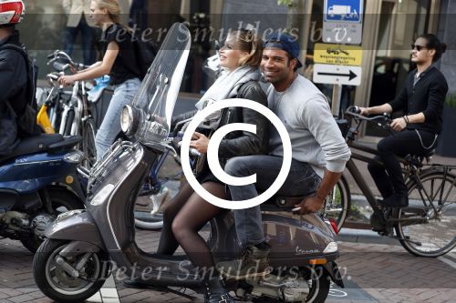 Amsterdam 12 mei 2017  
Edwin Jonker met vriendin op vespa scooter