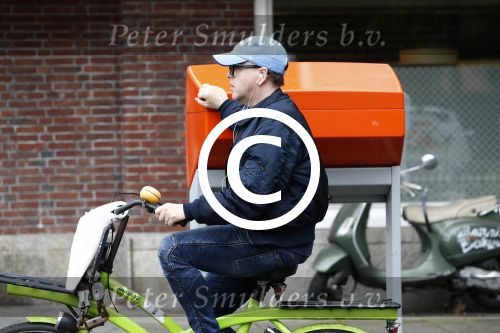 Amsterdam 13 mei 2017  
Marc Marie Huijbregts op zijn froene fiets in Amsterdam.