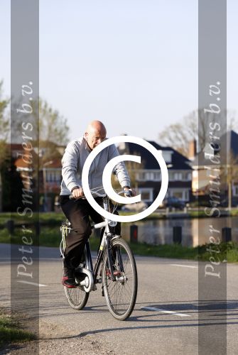 Amsterdam 6 april 2017 
Peter Plasman op de fiets langs de amstel.