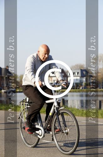 Amsterdam 6 april 2017 
Peter Plasman op de fiets langs de amstel.