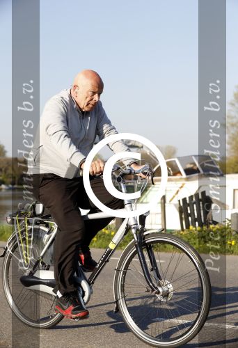 Amsterdam 6 april 2017 
Peter Plasman op de fiets langs de amstel.