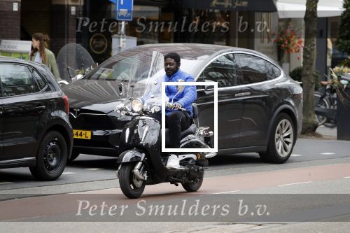 Amsterdam 10 april 2018
Acteur Andre Dongelmans op zijn scooter