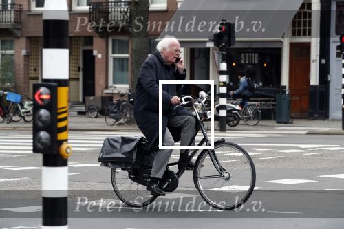 Amsterdam 10 april 2018
Henk Spaan bellend op de fiets in Amsterdam